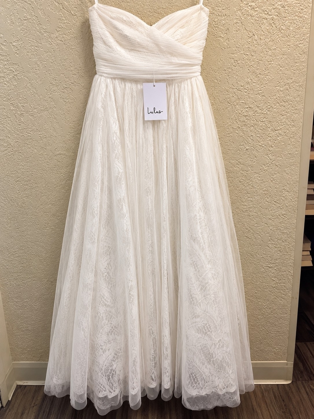 Lulus ivory/white wedding dress in a size Small, brand new with original tags